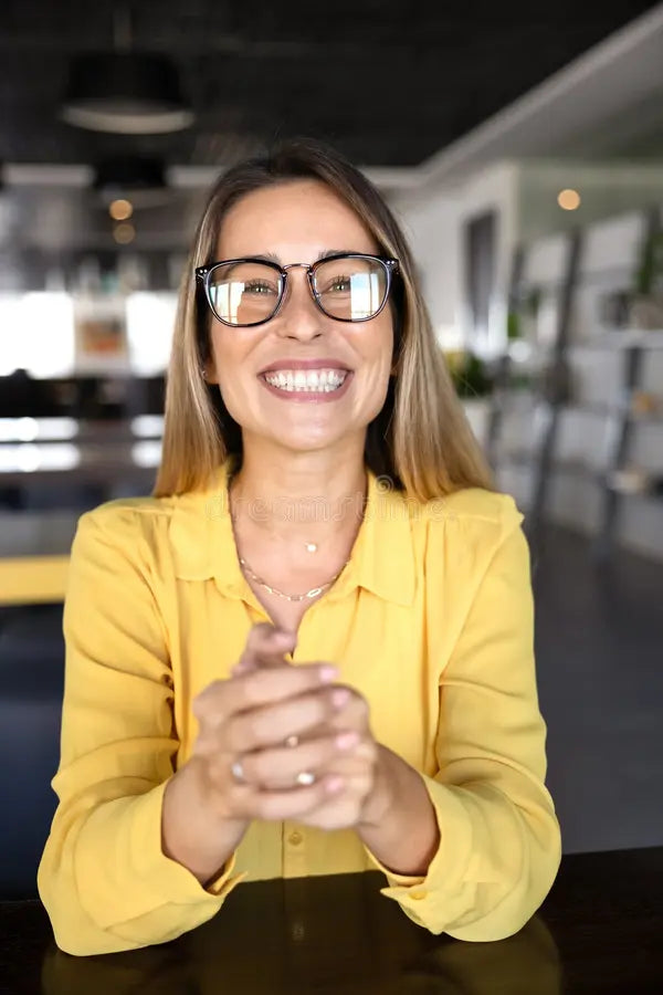 files/cheerful-professional-woman-glasses-talking-video-chat-beautiful-young-stylish-conference-co-working-office-table-420705487.webp